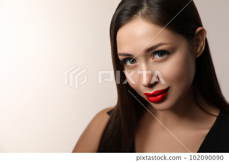 Beautiful woman with red lipstick on light background, space for text Beautiful woman with red lipstick on light background, space for text 102090090