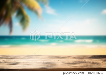 Empty wooden table on a beautiful blured tropical beach background. Summer holiday background for product display 102090632