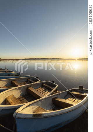 Sunrise at Lake Inba in winter Sunrise at Lake Inba in winter 102108682
