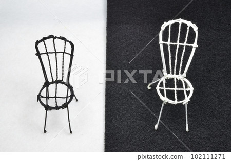 white and black chairs 102111271