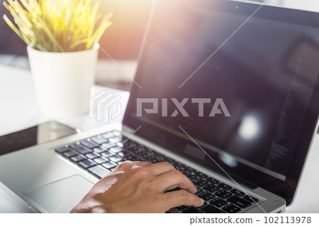 Programmer woman writing program HTML code sitting at workplace in office, IT software developer hands typing data coding programming with laptop computer, IT start up concept, Web application design Programmer woman writing program HTML code sitting at workplace in office, IT software developer hands typing data coding programming with laptop computer, IT start up concept, Web application design 102113978