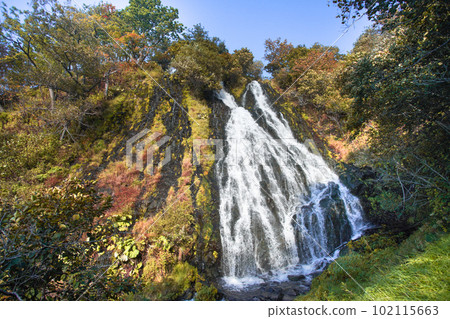 Oshinkoshin Falls, a famous waterfall in Shiretoko Shari, Hokkaido, which has been selected as one of Japan's top 100 waterfalls along with the Shiretoko Eight Views. Oshinkoshin Falls, a famous waterfall in Shiretoko Shari, Hokkaido, which has been selected as one of Japan's top 100 waterfalls along with the Shiretoko Eight Views. 102115663