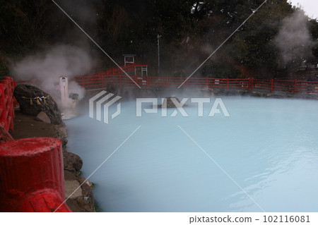 The landscape of Umi Jigoku (Sea Hell) blue water. One of the beppu hell tour located in snow fall at Beppu, Oita, Japan. 102116081