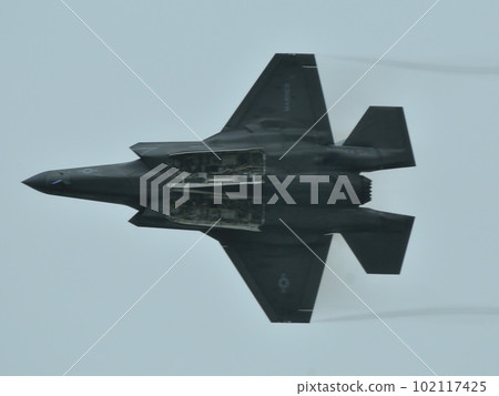 F-35B circling with open weapon bay 102117425