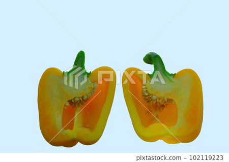 Halve the yellow pepper. 102119223
