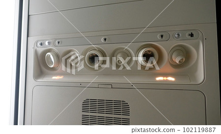 Detail of the ceiling of the interior of an airplane. Detail of the ceiling of the interior of an airplane. 102119887