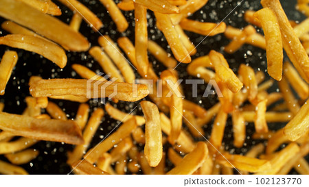 French fries - fried potatoes flying. French fries - fried potatoes flying. 102123770