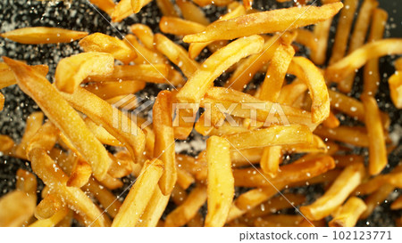 French fries - fried potatoes flying. French fries - fried potatoes flying. 102123771