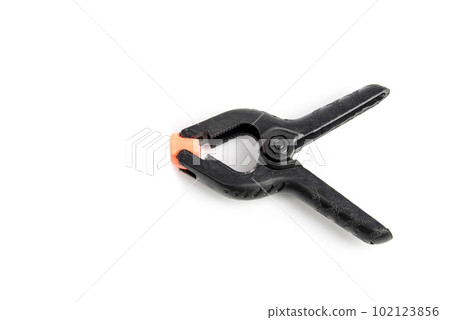 Pair of black clamp with orange plastic jaws, isolated over the white background 102123856