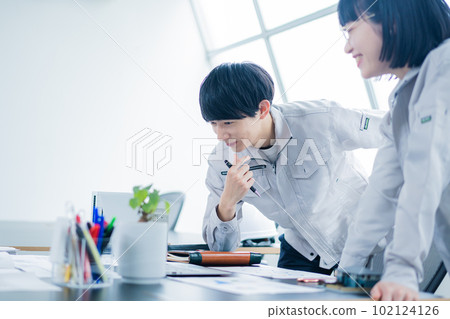 Engineer considering development plan Engineer considering development plan 102124126