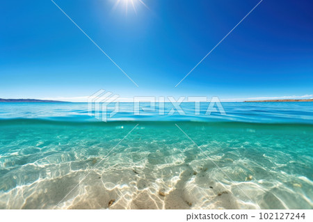 Clear sea and bright blue sky Clear sea and bright blue sky 102127244