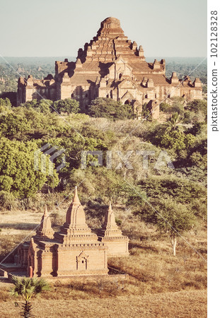 Temples of Bagan, ancient city and UNESCO World Heritage Site, color toning applied, Myanmar. Temples of Bagan, ancient city and UNESCO World Heritage Site, color toning applied, Myanmar. 102128328