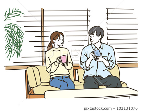 Asian couple cuddling indoors Asian couple cuddling indoors 102131076