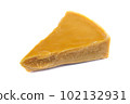 A piece of natural beeswax on a white background. 102132931