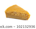A piece of natural beeswax on a white background. 102132936