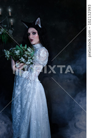 Beauty fashion woman in a manga costume, cat anime. Cosplay anime manga cat. Girl with cat ears 102132993