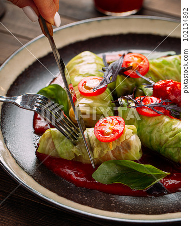 Russian cabbage rolls golubtsy with minced beef Russian cabbage rolls golubtsy with minced beef 102134892