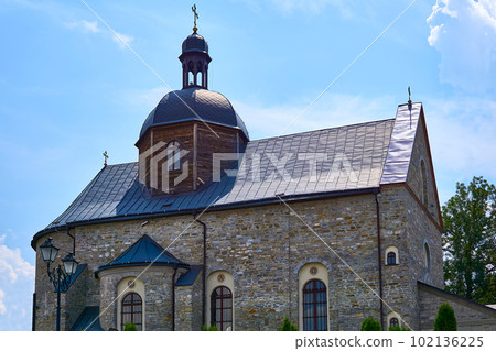 Stone Christian church and clear blue sky in sunny day Stone Christian church and clear blue sky in sunny day 102136225