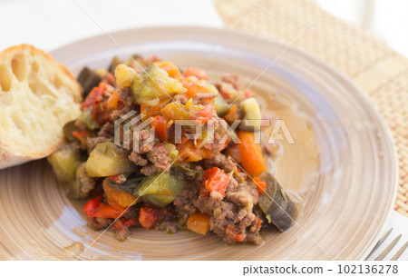 dish of vegetable stew. stewed eggplant, minced meat, carrots, peppers, onion squid dish of vegetable stew. stewed eggplant, minced meat, carrots, peppers, onion squid 102136278