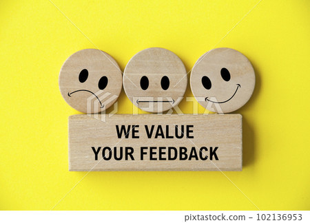 We value your feedback text on wooden block with happy, sad and neutral emoticon faces on wooden circle. Customer feedback, satisfaction and evaluation and concept We value your feedback text on wooden block with happy, sad and neutral emoticon faces on wooden circle. Customer feedback, satisfaction and evaluation and concept 102136953