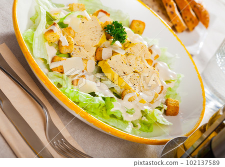 Fresh Caesar salad with chicken Fresh Caesar salad with chicken 102137589