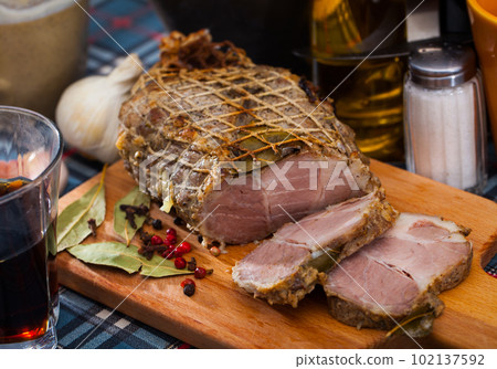 Fresh ham baked in netting Fresh ham baked in netting 102137592