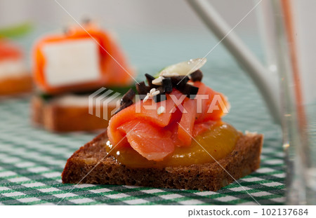 Close up image of canape with salmon Close up image of canape with salmon 102137684