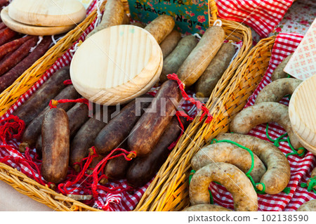 Homemade farm sausages on counter Homemade farm sausages on counter 102138590