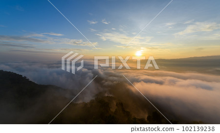 sea of mist and sunrise, view from Aiyoeweng View Point, Yala Province, Thailand 102139238