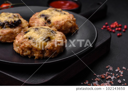 Delicious baked meat boats with mushrooms, cheese, salt and spices Delicious baked meat boats with mushrooms, cheese, salt and spices 102143650