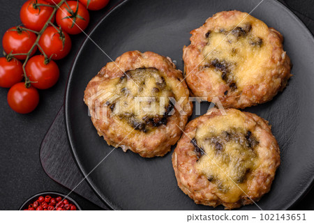 Delicious baked meat boats with mushrooms, cheese, salt and spices Delicious baked meat boats with mushrooms, cheese, salt and spices 102143651