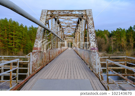 The old railway bridge. Historic narrow gauge railway bridge. A popular walking spot in Valmiera, Latvia 102143670