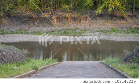 boat ramp on Lamine River in early spring at Roberts Bluff Access near Blackwater, Missouri 102145229