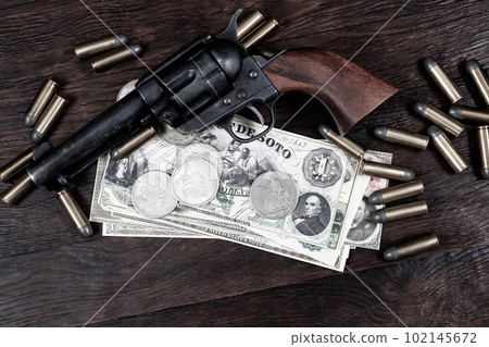 Old west Colt Peacemaker and US banknotes and silver certificates with silver dollar coins and .45 caliber revolver ammunitions Old west Colt Peacemaker and US banknotes and silver certificates with silver dollar coins and .45 caliber revolver ammunitions 102145672