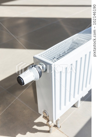Close-up of white central heating floor radiator 102146190