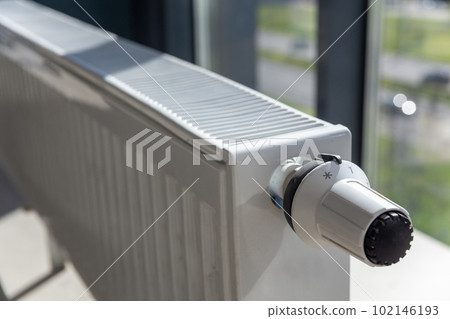 Close-up of white central heating floor radiator 102146193