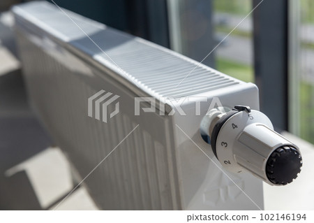 Close-up of white central heating floor radiator Close-up of white central heating floor radiator 102146194