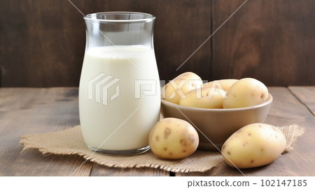 Potato milk in glass, alternative vegan gluten lactose soy free drink, trendy content, generative AI 102147185