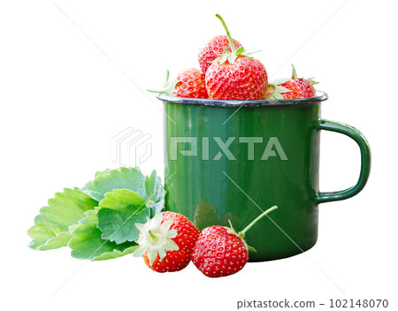 Enameled mug of strawberries and berries isolated. Enameled mug of strawberries and berries isolated. 102148070