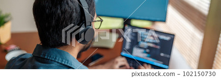 Male freelancer making new project as web designer or programmer on his computer at home office 102150730