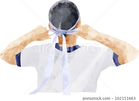 A male student in a white headband at an athletic meet 102151663