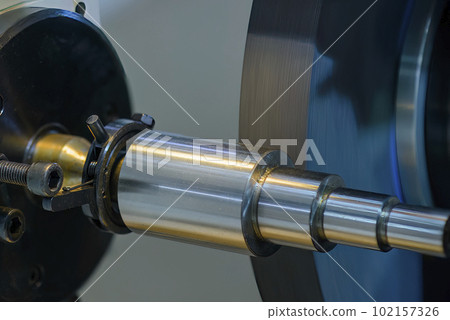 Close up scene the cylindrical grinding machine operation. Close up scene the cylindrical grinding machine operation. 102157326