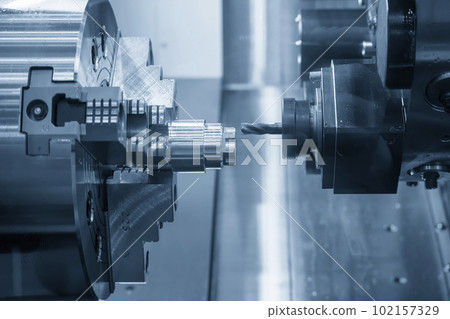 The CNC lathe machine milling cut the metal shaft parts by milling spindle. The CNC lathe machine milling cut the metal shaft parts by milling spindle. 102157329