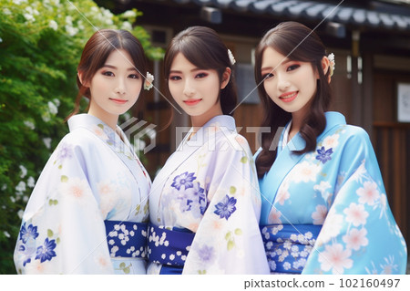 Three Japanese women wearing yukata Three Japanese women wearing yukata 102160497