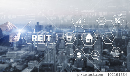 REIT. Real estate investment trust. Financial Market. Hand pressing button on screen REIT. Real estate investment trust. Financial Market. Hand pressing button on screen 102161884