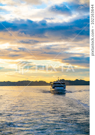 Matsushima, one of Japan's three most scenic spots, the first sunrise seen from a boat, the sunrise, the morning view, Matsushima-cho, Miyagi Prefecture Matsushima, one of Japan's three most scenic spots, the first sunrise seen from a boat, the sunrise, the morning view, Matsushima-cho, Miyagi Prefecture 102163644