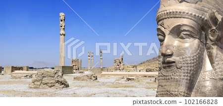 Horizontal banner with columns of Apadana Palace built by Darius the Great and face of assyrian protective deity lamassu - human-headed winged bull, Persepolis, Iran Horizontal banner with columns of Apadana Palace built by Darius the Great and face of assyrian protective deity lamassu - human-headed winged bull, Persepolis, Iran 102166828