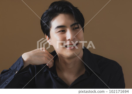 man in black dress shirt 102171694