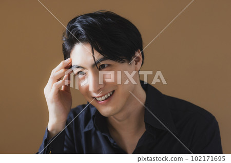 man in black dress shirt 102171695