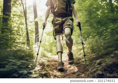 Closeup of man with prosthetic leg hiking in the woods during spring summer. Created with Generative AI technology. 102174031